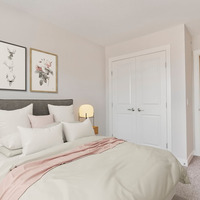 Medium photo of a secondary bedroom of the logan floorplan by brookfield residential in calgary