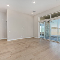 Medium living room and oversized glass sliding door