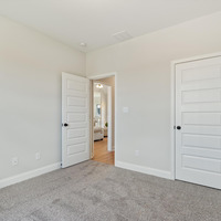 Medium spare bedroom closet