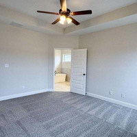 Medium master bedroom and hallway