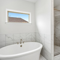 Medium master bathroom tub