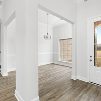 Medium entrance with dining room