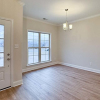 Medium entry and dining room