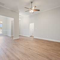 Medium family room looking into dining room
