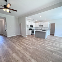 Medium family room looking into kithcen