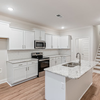 Medium kitchen and stairs