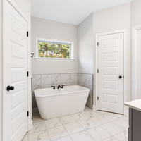 Medium master bathroom tub
