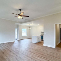Medium family room looking into kitchen