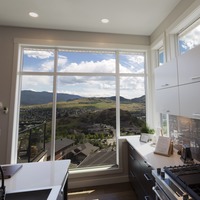 Medium kitchen views big windows white cabinetry