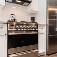 Medium white kitchen stainless steel appliances