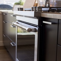 Medium fine moulding trim window appliance dark cabinetry