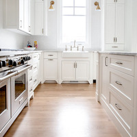 Medium veranda homes custom builder calgary white cabinets range marble