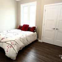 Medium 19 emerald hill dr. show home for sale by emerald park homes white city walk out bungalow main floor bedroom spare bedroom large closet 1024x683